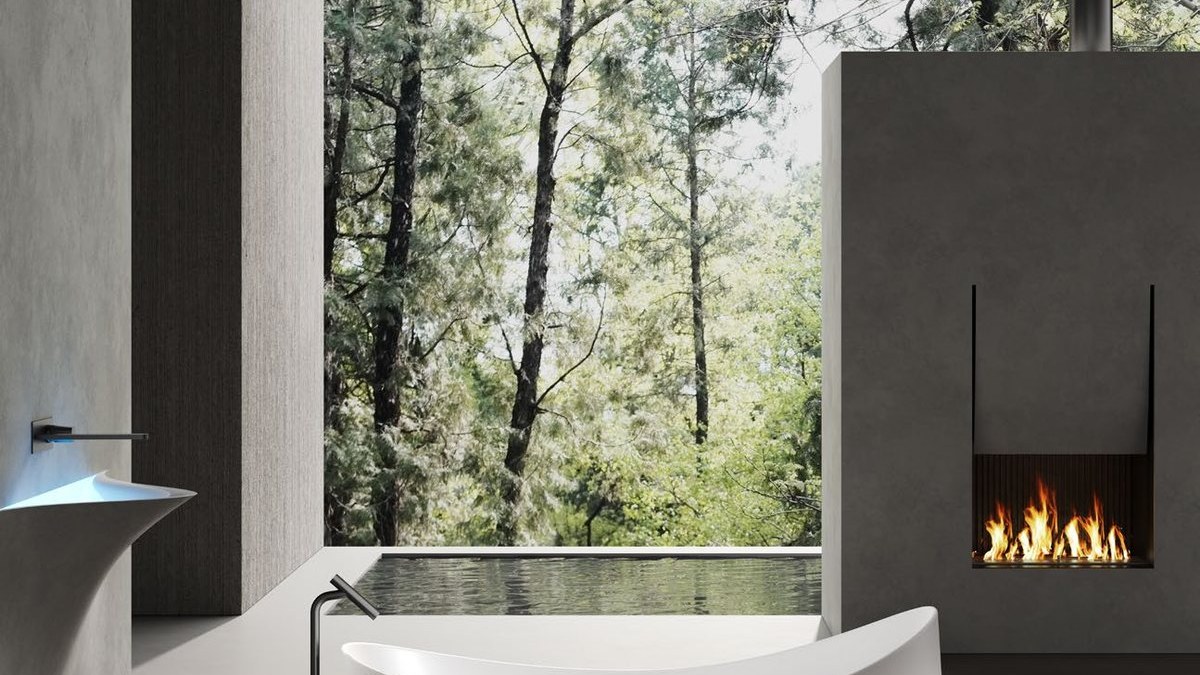 A freestanding solid surface bathtub in a spa setting