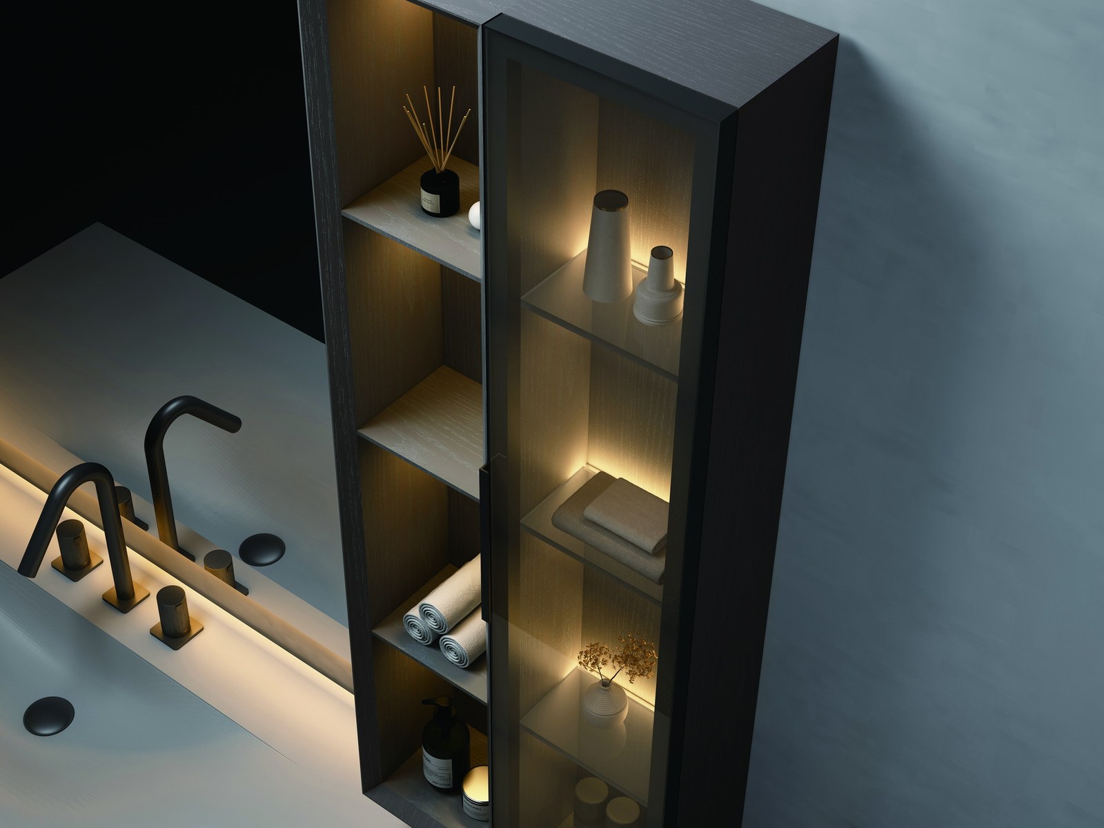 A dark vanity cabinet with open shelves and a wall-mounted tap
