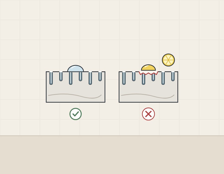 Illustration of two sealed stone sections, one with a beading water drop and one where an acid drop has roughened the surface