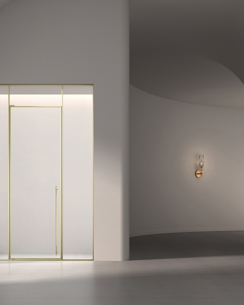 A frameless shower enclosure in a residential bathroom