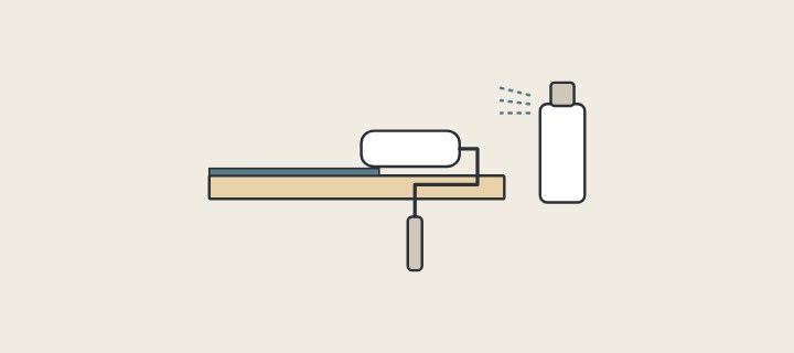 Illustration: a roller laying a coat on a board beside a spray can