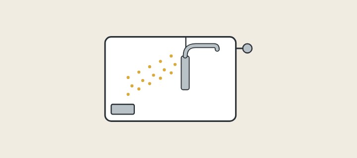 Illustration: a coating chamber with a faucet part hanging inside and particles travelling towards it