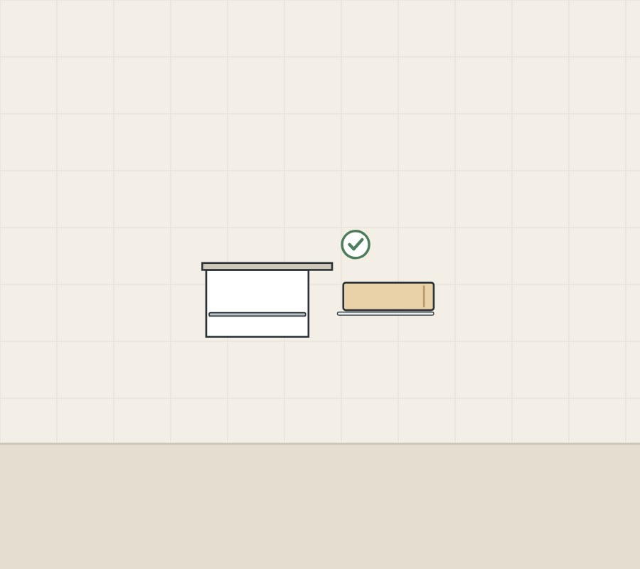 Illustration of a vanity side section with the drawer rear past the top edge and a tick