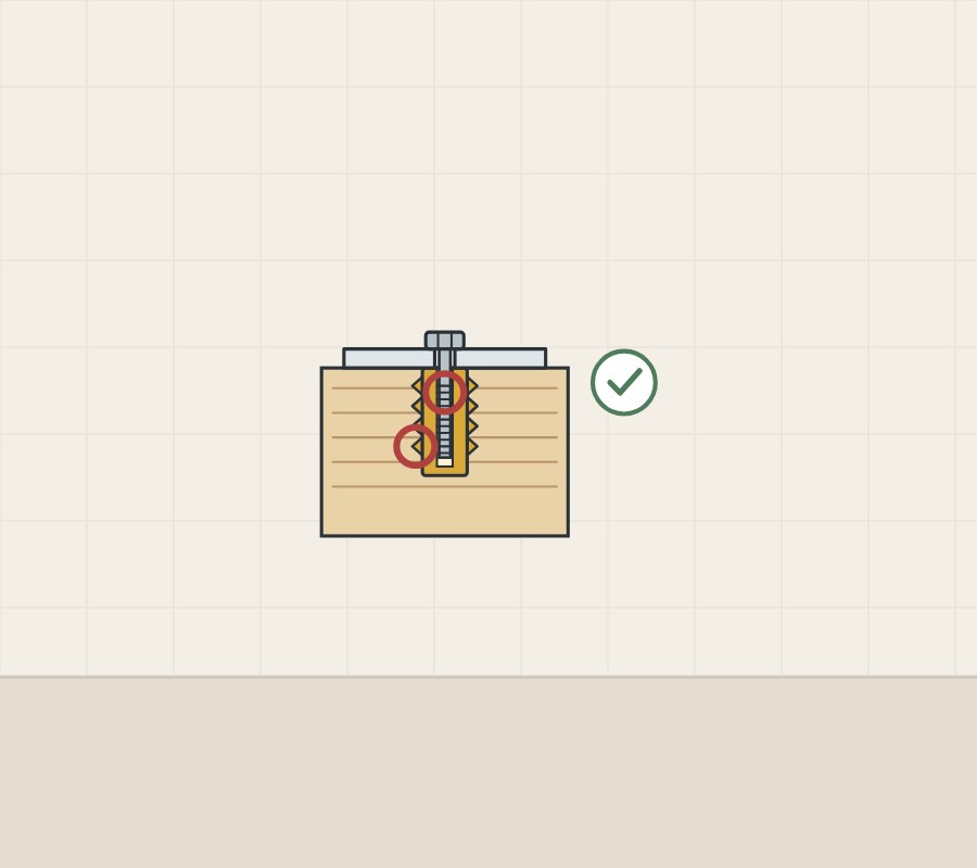 Illustration of a plate bolted into a threaded insert with rings on both joints and a check mark