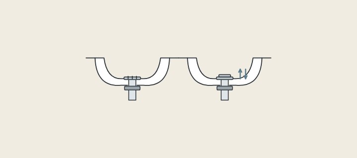 Illustration: two basins in section: one with an open grid drain and one with a stopper that moves up and down