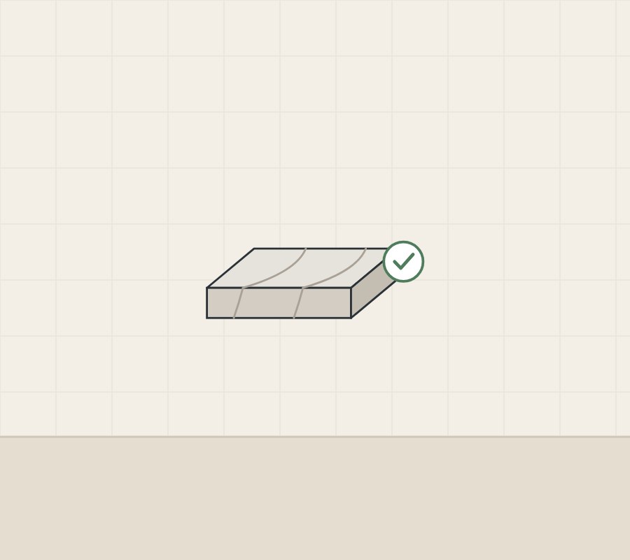 Illustration of a corner sample showing top, front edge and end, with a tick