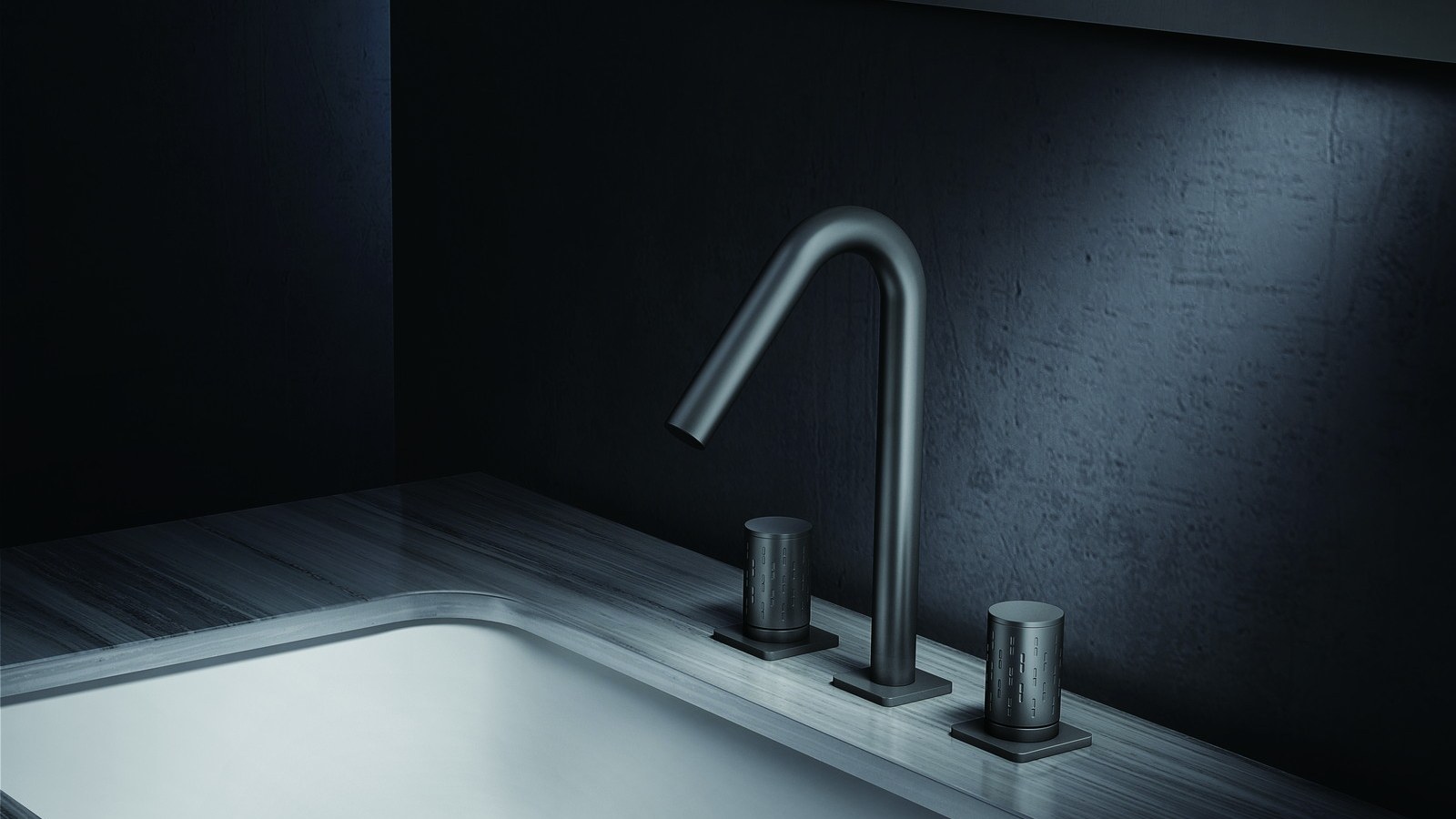 A black deck-mounted faucet beside an undermount basin