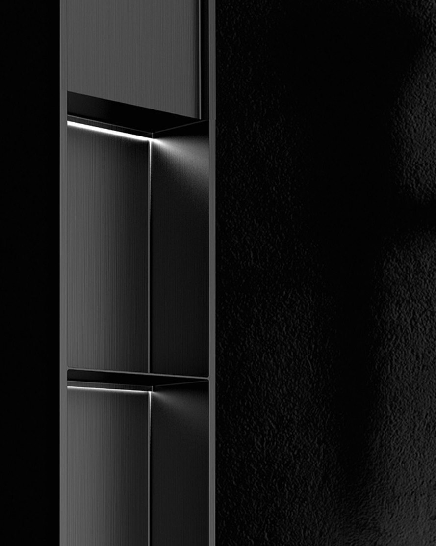 A multi-tier niche unit set into a dark wall