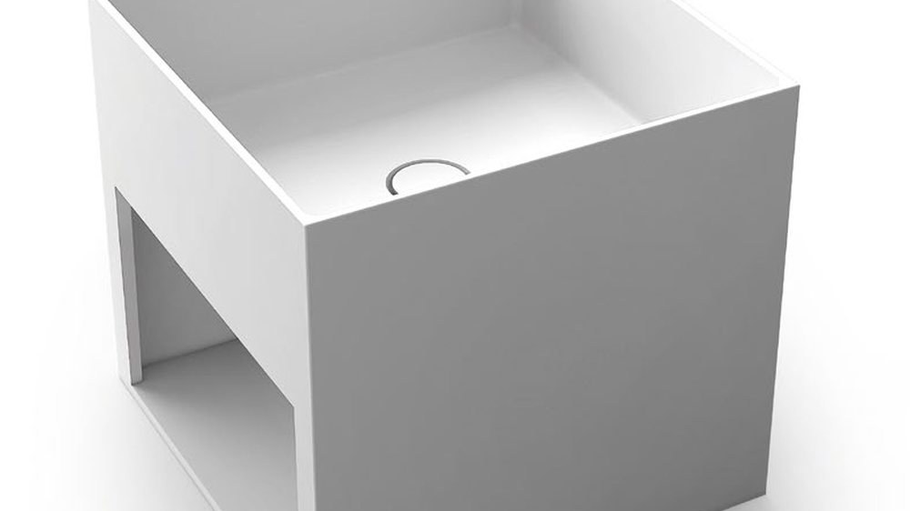 An integrated basin and vanity top formed as one piece
