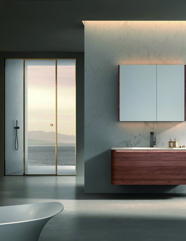 A bathing area with a mirror cabinet and shower fittings