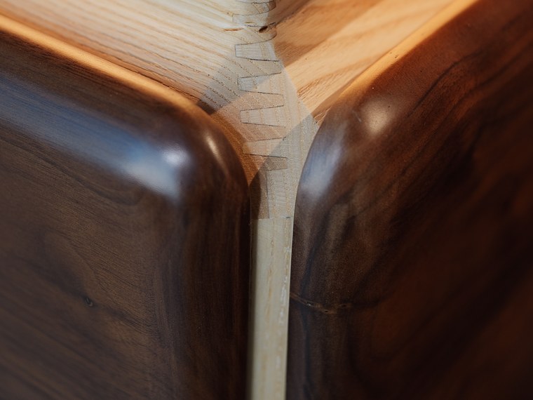Rounded walnut corner with finger-jointed carcass