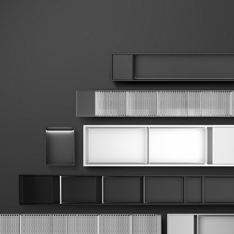 Stainless steel niche modules arranged on a dark wall