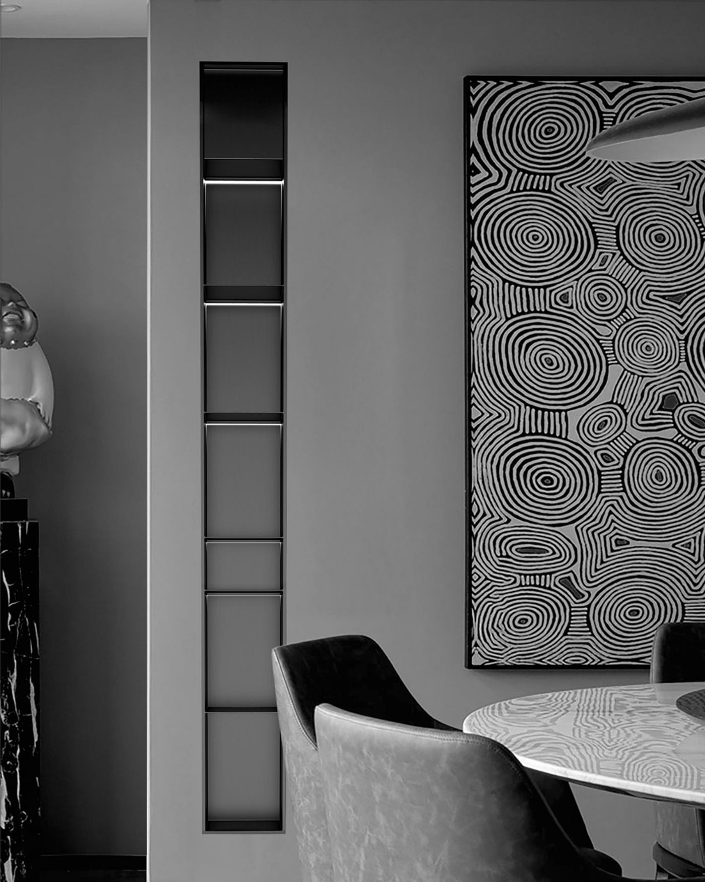 A tall recessed niche column in a finished interior