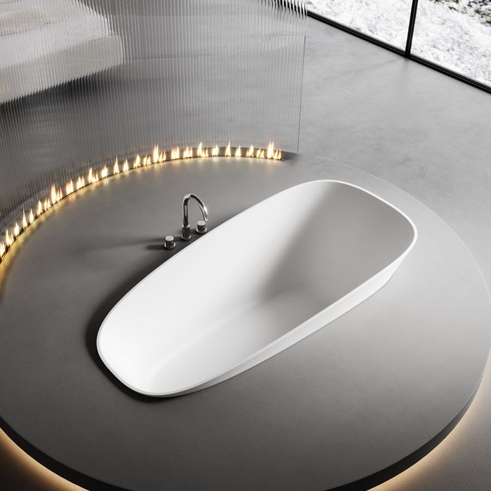 Round built-in solid surface tub set into a curved deck