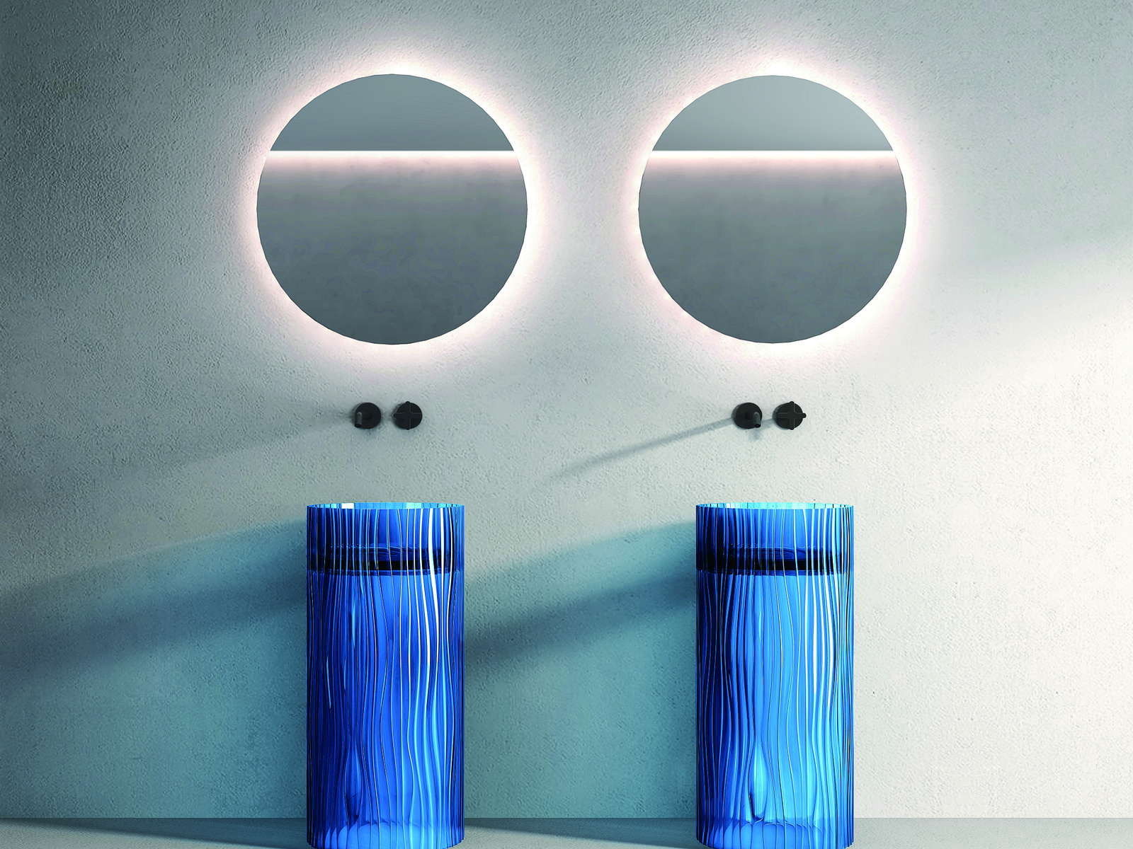 Paired translucent basins specified for a project bathroom