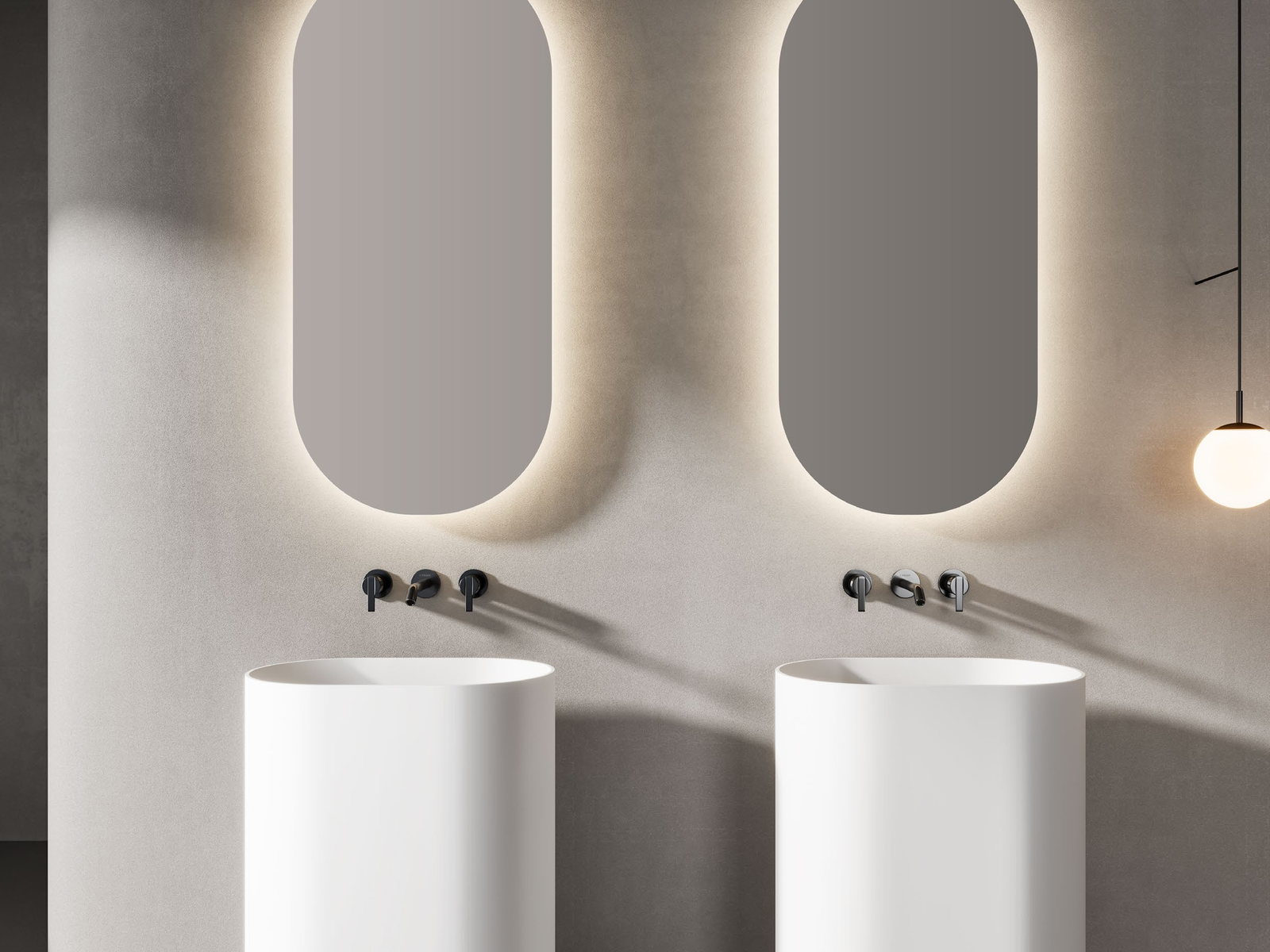 Showroom display of paired basins with mirrors