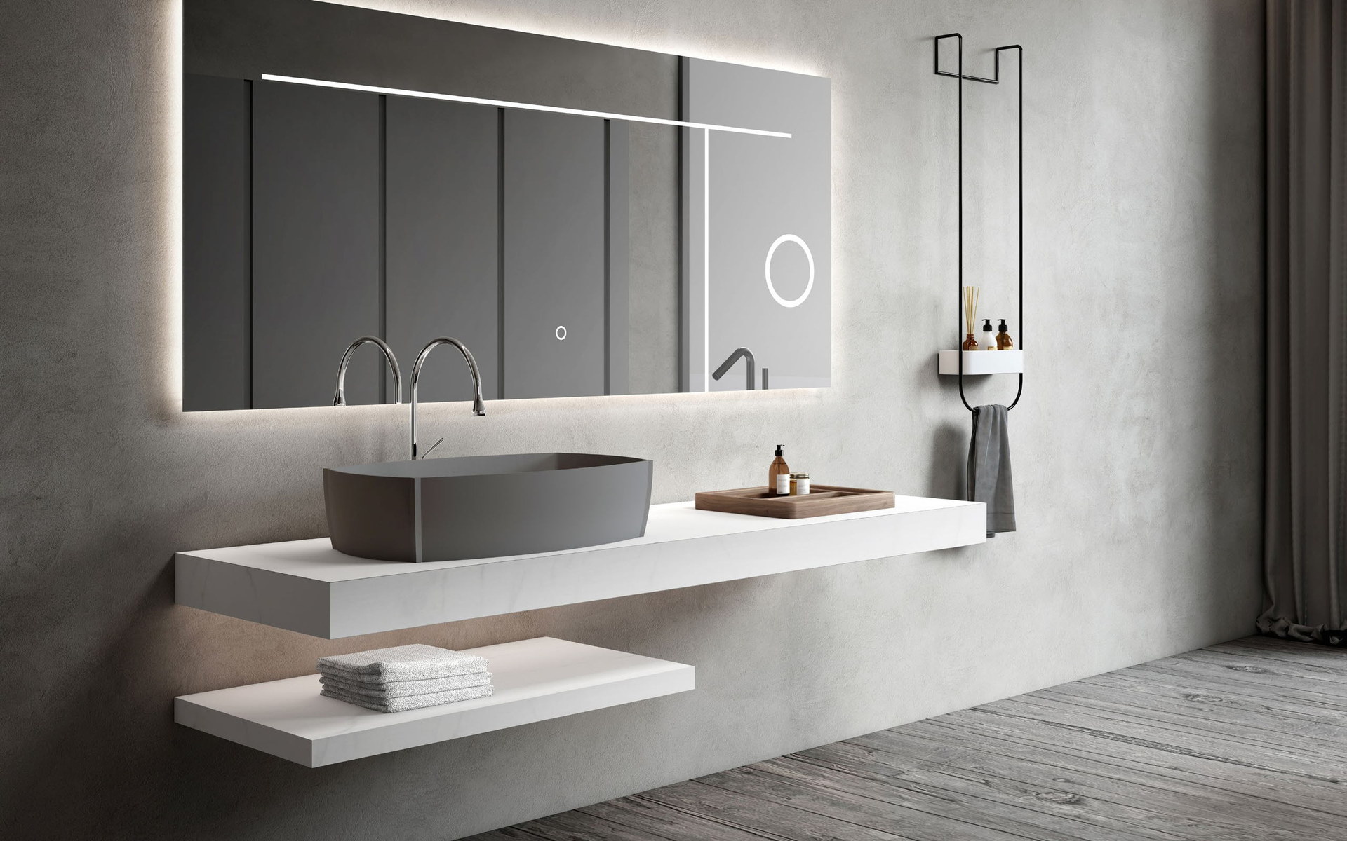 Basins installed along a long wall-hung vanity top