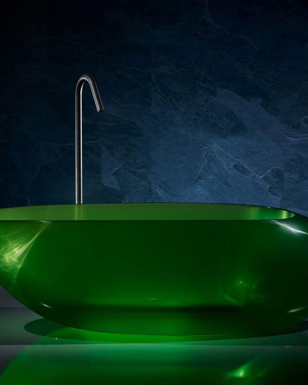 Olive translucent resin bathtub with sea view