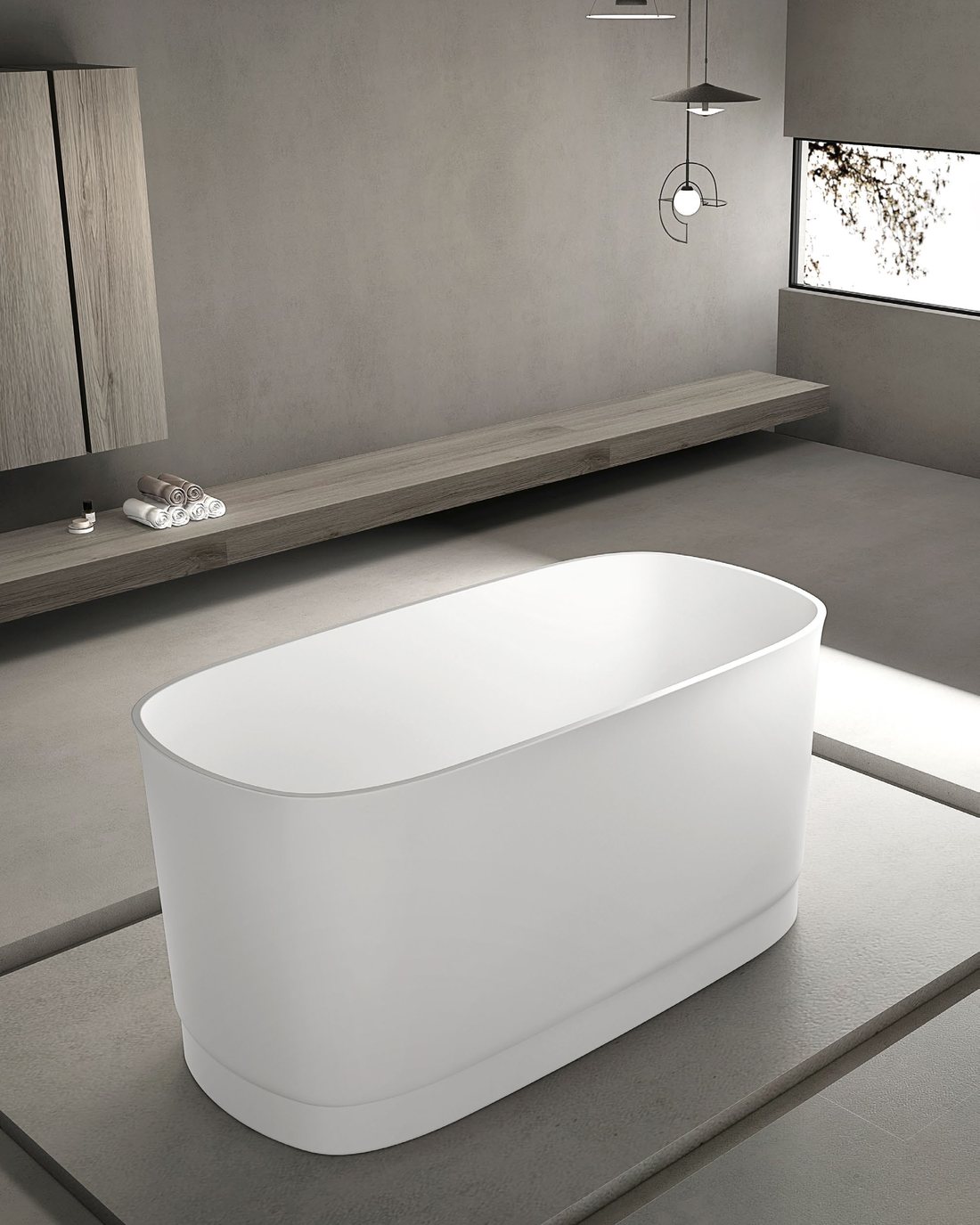 Compact upright soaking tub with floor-standing filler and stool