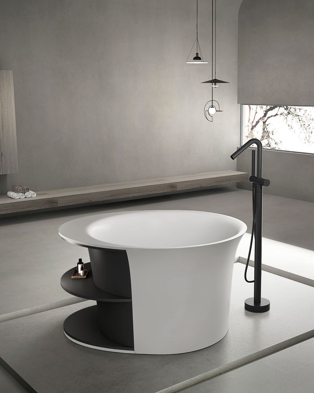 Compact oval soaking tub on a stone platform