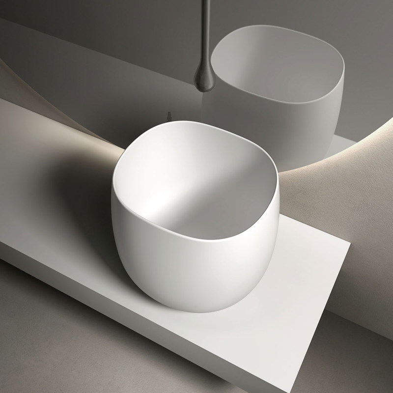 Round vessel basin shown with tap and waste position