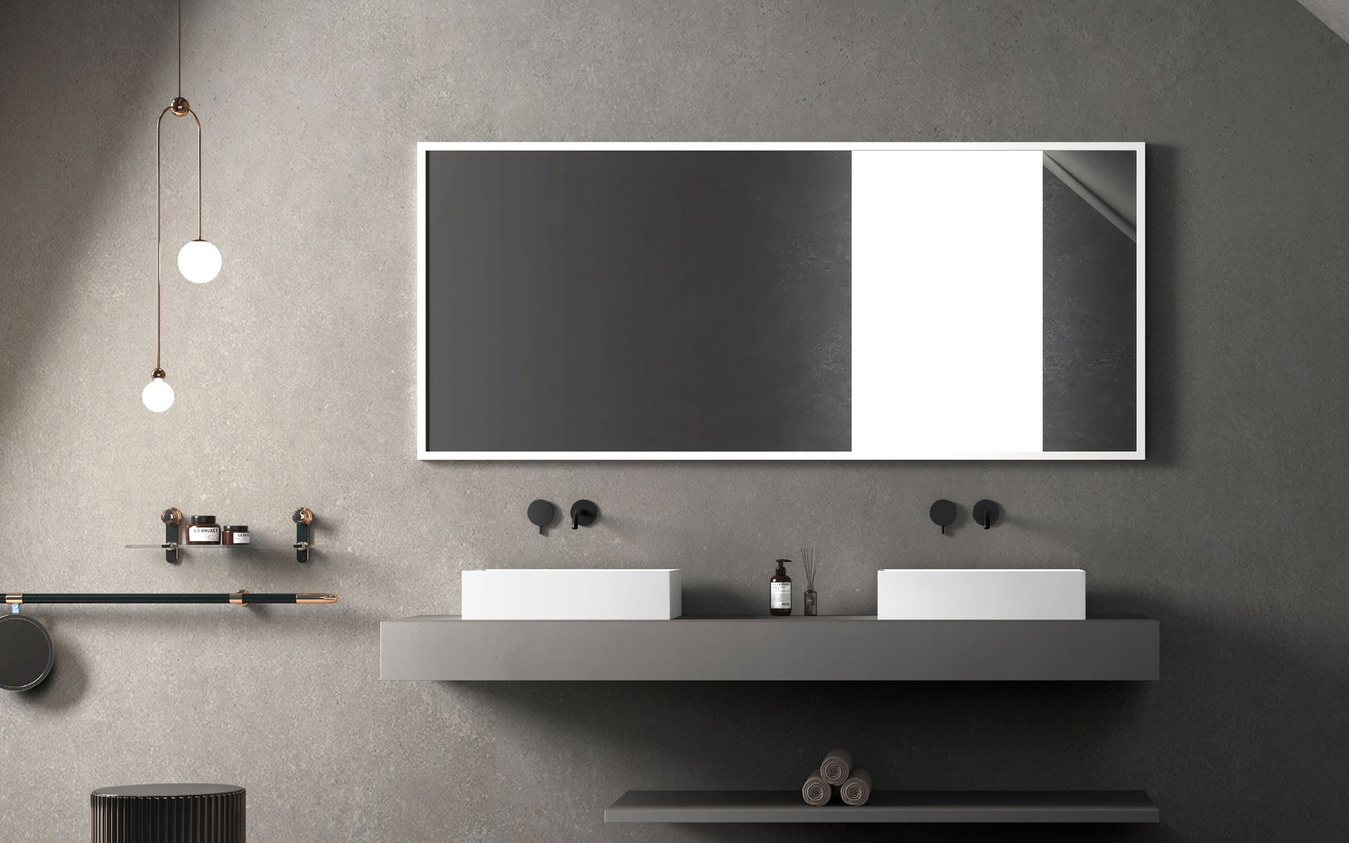 A long wall-hung vanity beneath a wide lit mirror