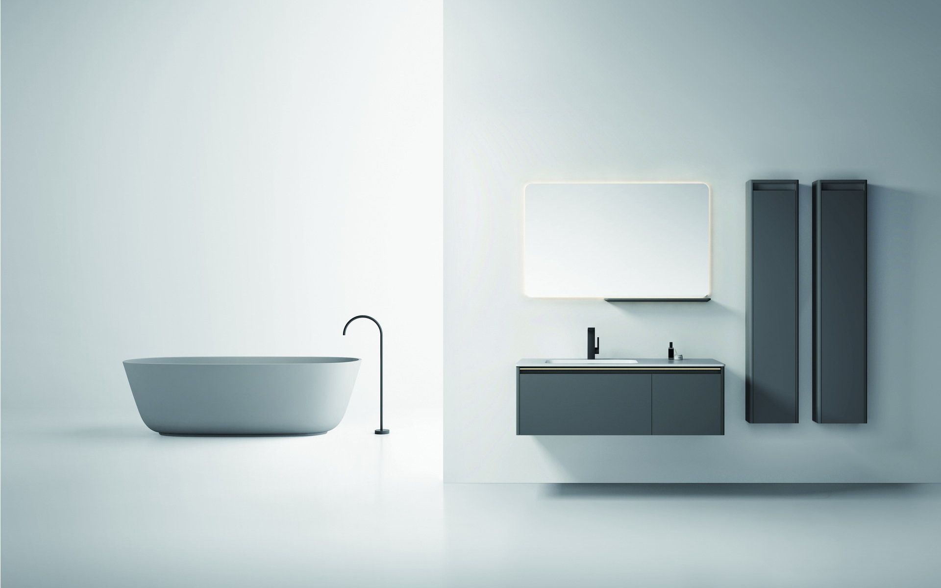 Integrated basin and vanity top fitted against a finished wall