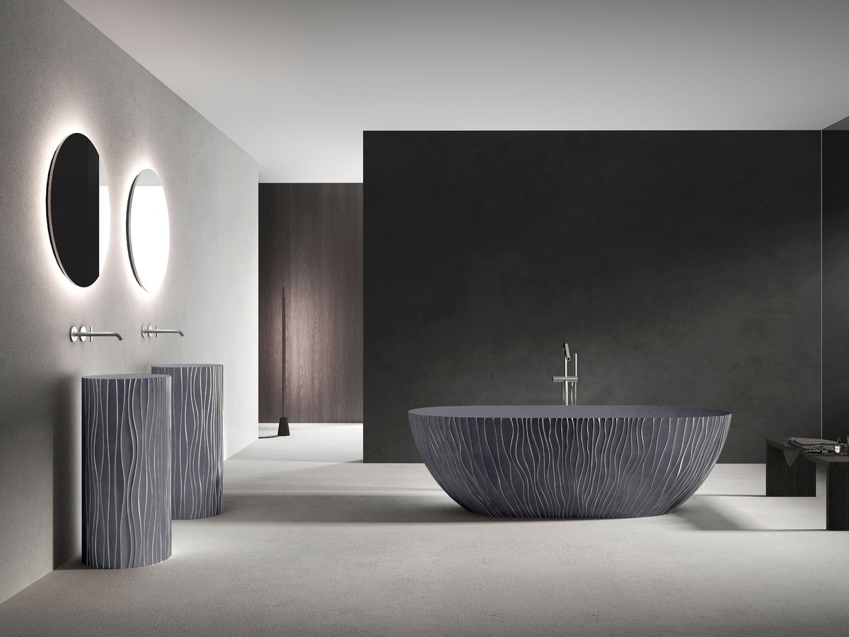 Custom built-in solid surface bathtub with tiled deck