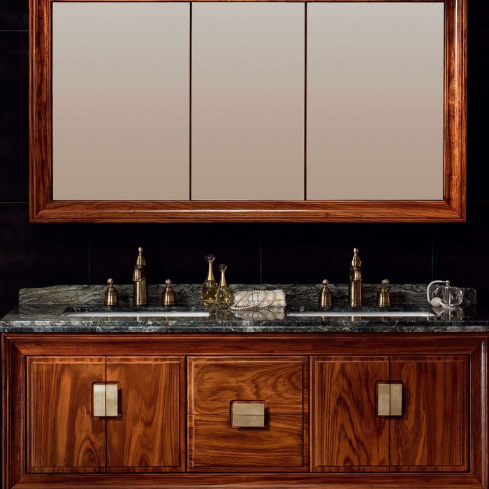 Double-sink floor-standing vanity in a hotel bathroom