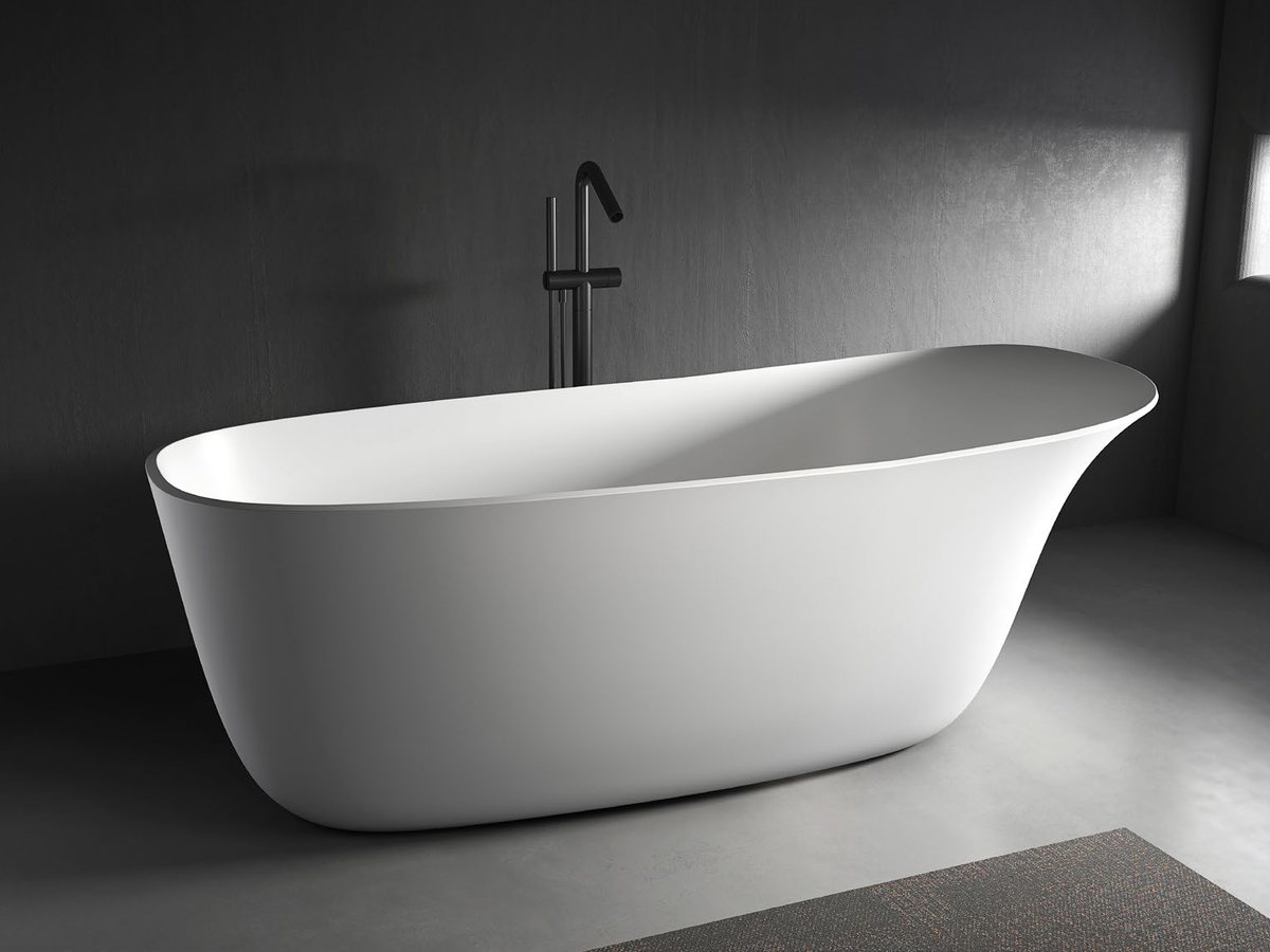 Asymmetrical freestanding solid surface bathtub