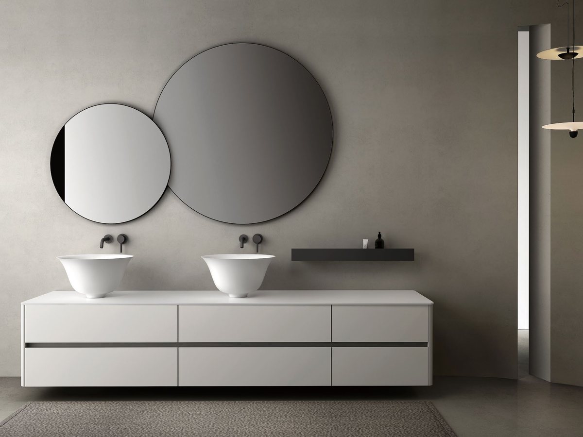 Commercial restroom with integrated basin vanity top
