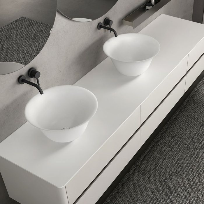 Integrated basin and vanity top on a double bathroom cabinet