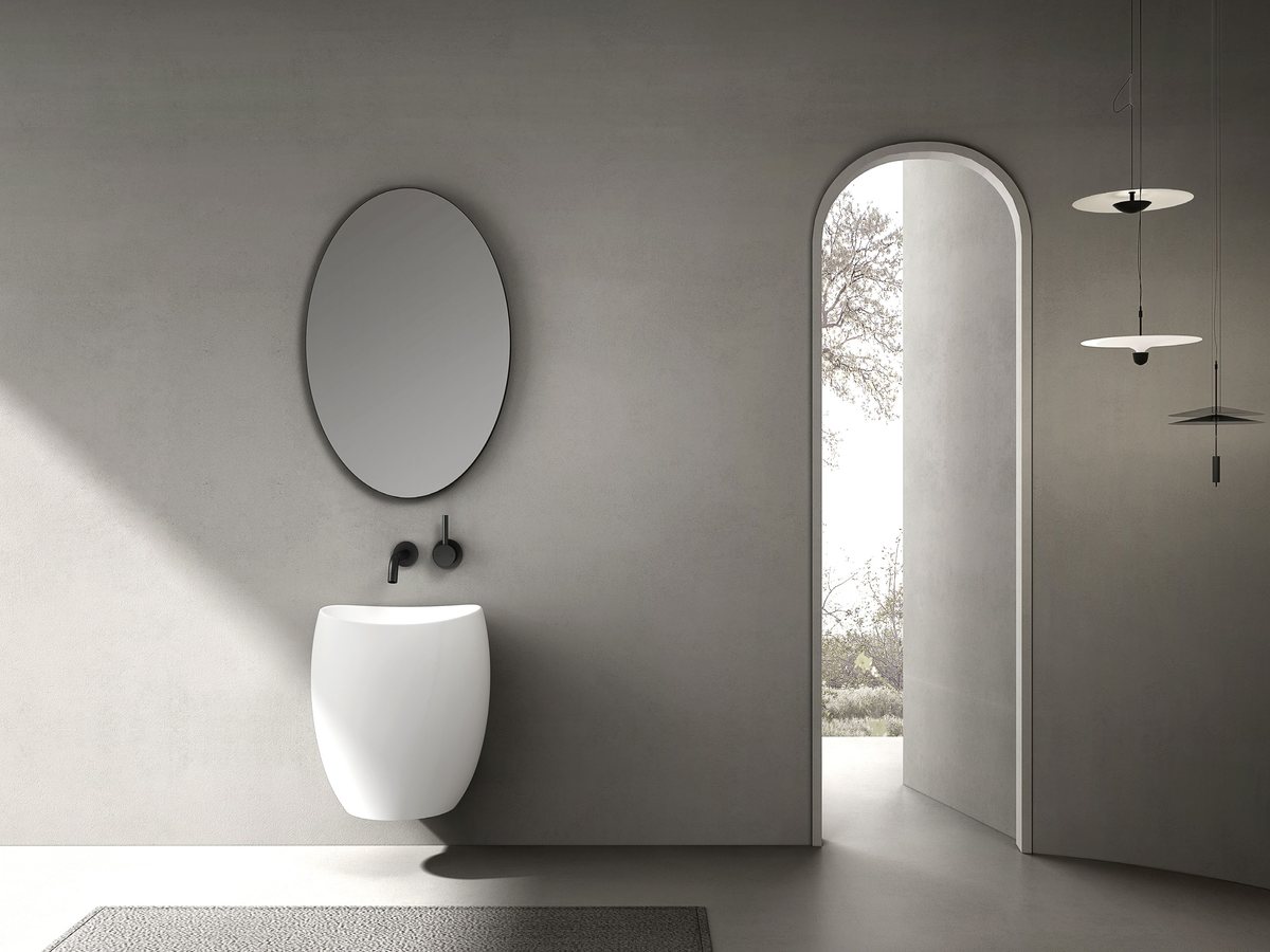 Hotel guest bathroom with a freestanding pedestal basin