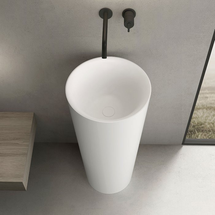 Freestanding pedestal basin with concealed trap inside the column