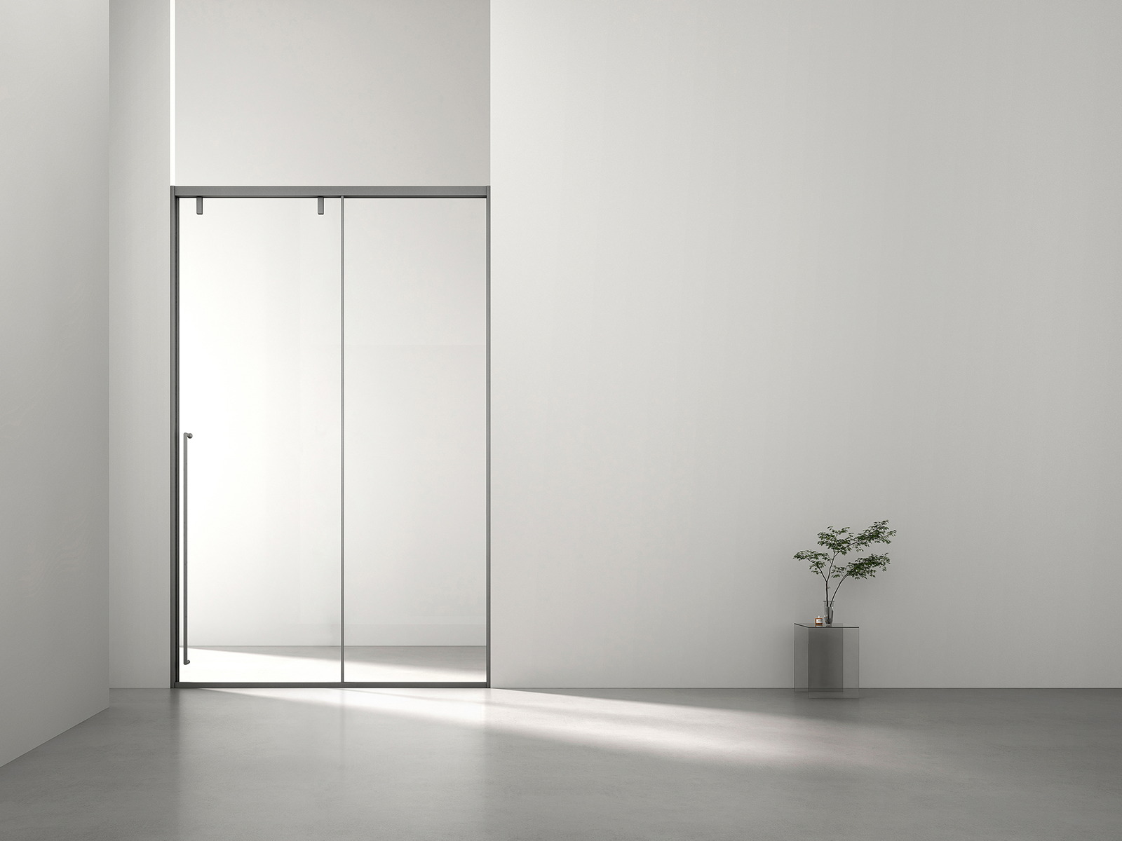 Sliding shower enclosure with clear glass panels and minimal framing