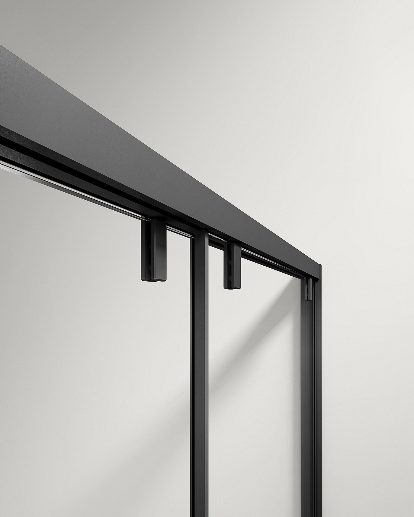 A slim shower enclosure frame profile meeting the glass edge