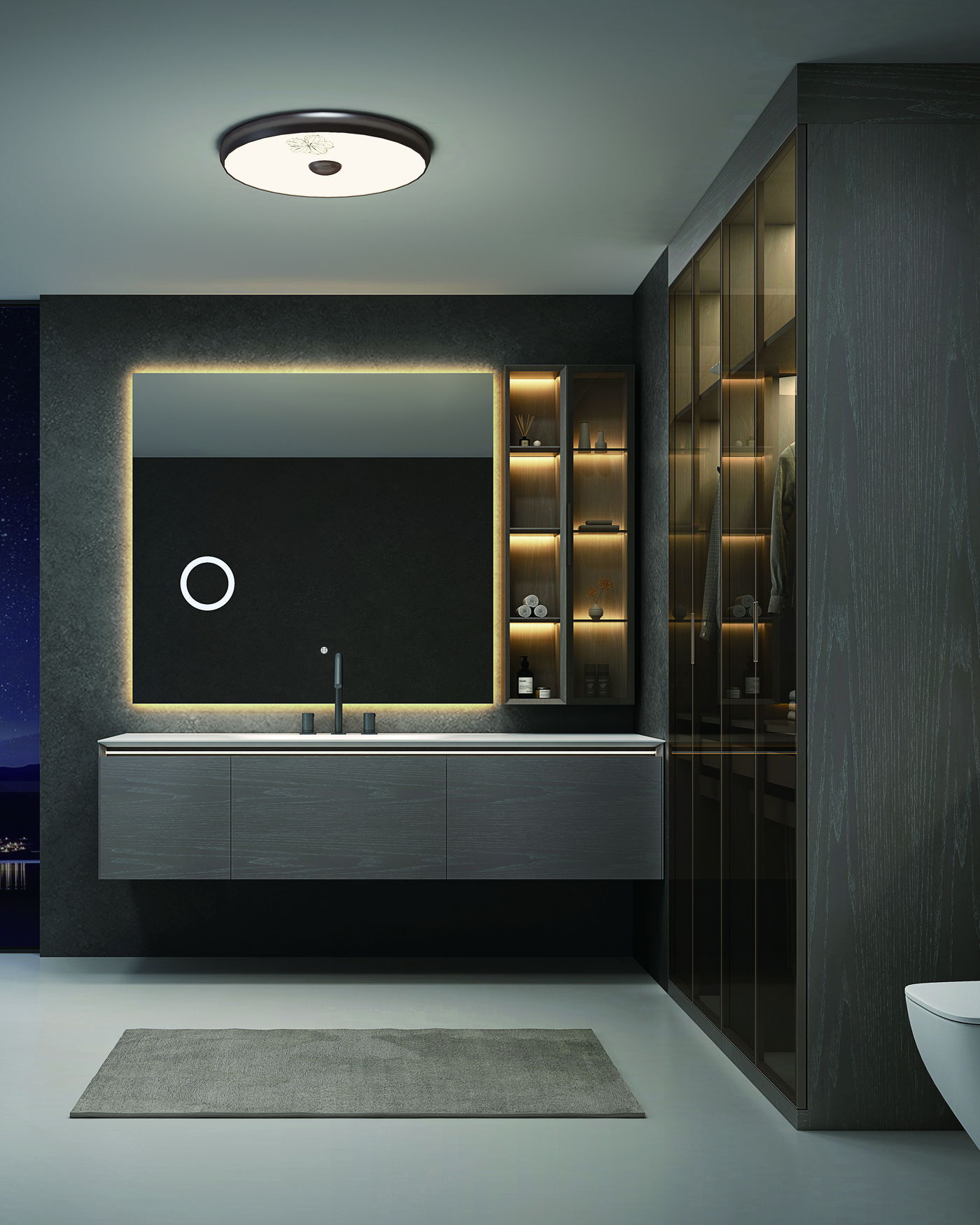 A finished bathroom interior with a wall-hung toilet and vanity