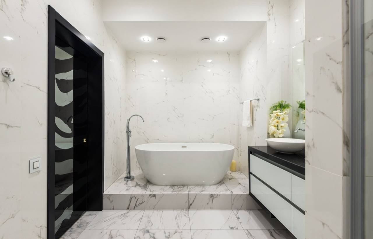 Wall-mounted bathroom vanity for multi-unit development