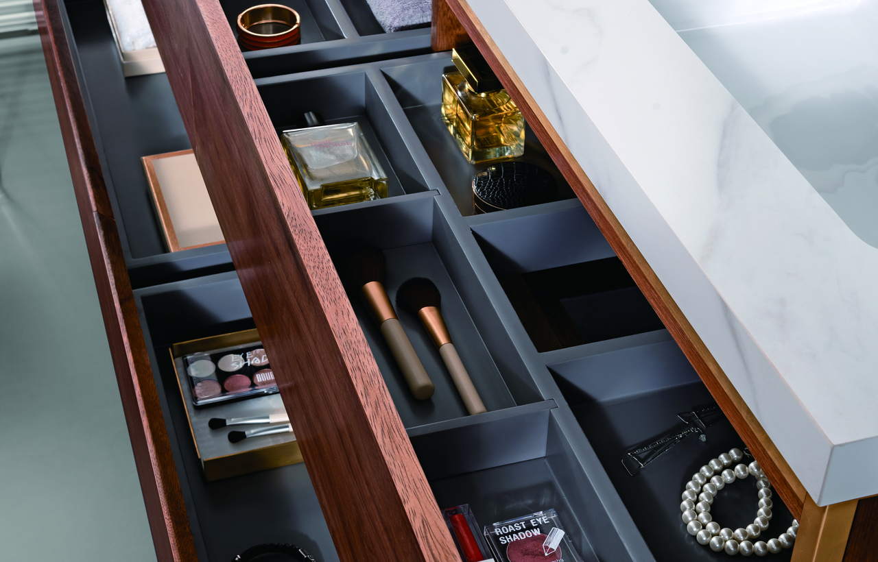 Wall-mounted vanity with visible floor space and organized drawers
